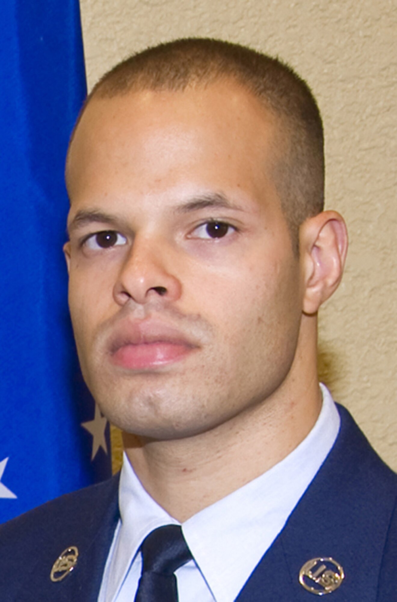 Senior Airman Stanley De Jesus, 345th Airlift Squadron, received a Pitsenbarger Award, an Embry-Riddle University Award and a William Carey University Award during the Nov. 2, 2011, Community College of the Air Force commencement ceremony at Bay Breeze Event Center at Keesler Air Force Base, Miss. He’s working
on a bachelor’s degree in computer science with Trident University International.  (U.S. Air Force photo by Adam Bond)