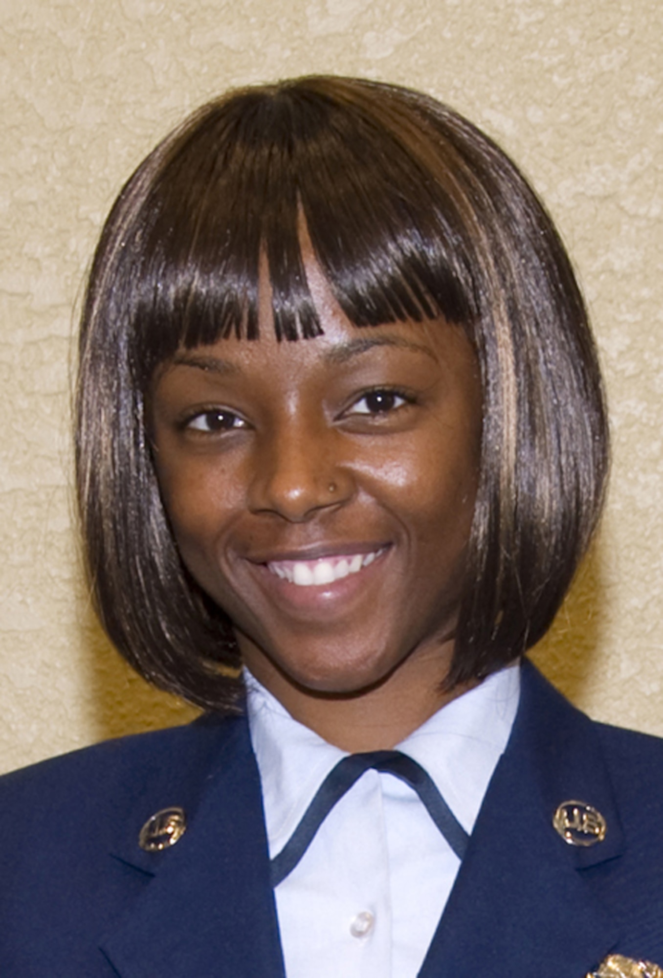 Staff Sgt. Isunte Barnes, 81st Logistics Readiness Squadron, received a Pitsenbarger
Award, an Embry-Riddle University Award and a William Carey University Award during the Nov. 2, 2011, Community College of the Air Force commencement ceremony at Bay Breeze Event Center at Keesler Air Force Base, Miss. She’s pursuing a bachelor’s degree in technical management with Embry-Riddle Aeronautical University.  (U.S. Air Force photo by Adam Bond)