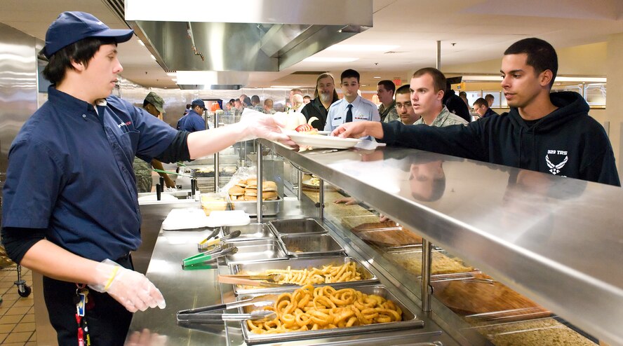 A meals is distributed Nov. 7, 2011, at the Patterson Dining Facility at Dover Air Force Base, Del. The DFAC recently underwent an extensive three-week rennovation, including a new salad bar, themed seating areas and an expanded serving area. (U.S. Air Force photo by Roland Balik)