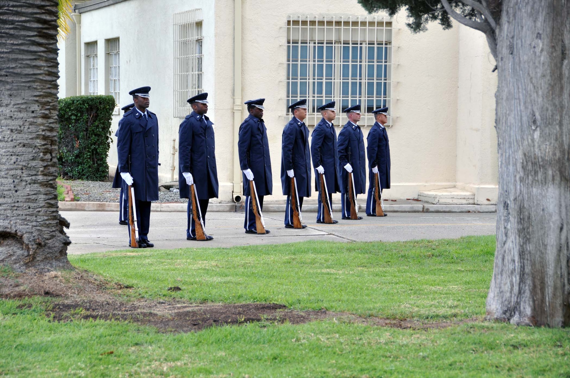 Seven members of the Blue Eagle’s Total Force Honor Guard firing party stand at attention after firing a 21-gun salute at the Nov. 6 memorial service held at March Air Reserve Base, Calif. for retired Maj. Gen. Sloan R. Gill, who passed away Aug. 22, 2011. Gill was the former chief of Air Force Reserve and former commander of Air Force Reserve Command.  (U.S. Air Force photo/Master Sgt. Linda Welz)