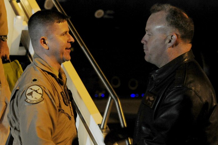 Lt Col. Anthony Carr is greeted by Col. Erik Hansen after returning from a 120- day deployment to Southwest Asia at Joint Base Charleston- Air Base, Nov. 5. More than 130 Airmen from the 14th Airlift Squadron, 437th Airlift Wing were assigned to the 816th Expeditionary Airlift Squadron, supporting combat operations in the U.S. Central Command area of responsibility. Flying the C-17 Globemaster III, the 14 AS Airmen flew roughly 2,800 sorties, logged more than 7,900 combat flying hours and airlifted more than 27,000 Airmen, Soldiers, Marines and distinguished visitors throughout the AOR. The squadron also performed 382 airdrops, delivering 16.7 million pounds of cargo to 52 drop zones, breaking the record for deployed C-17 combat operations. Carr is the 14 AS commander and Hansen is the 437 AW commander.  (U.S. Air Force photo/ Staff Sgt. Nicole Mickle 
