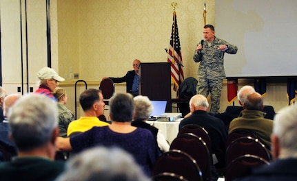 Col. Richard McComb addresses retirees and their spouses at the Retiree and Spouse Information Fair at the Charleston Club on Joint Base Charleston - Air Base, Nov. 5. The fair was held to inform retirees about their benefits and services available on JB Charleston. McComb is the Joint Base Charleston commander. (U.S. Air Force photo/Airman 1st Class Ashley Galloway)