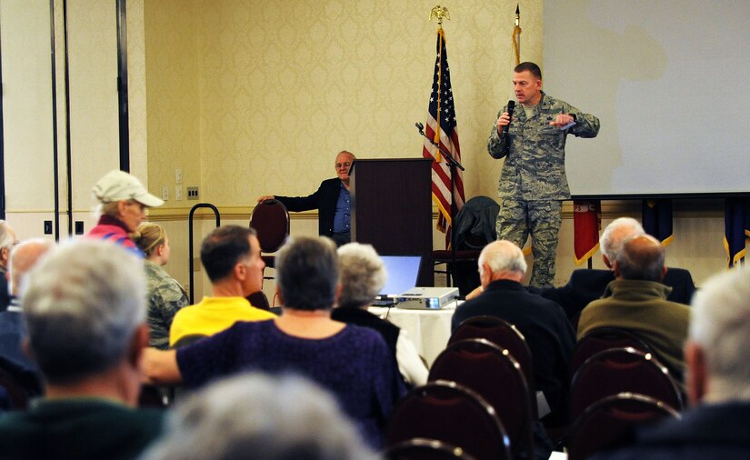 Col. Richard McComb addresses retirees and their spouses at the Retiree and Spouse Information Fair at the Charleston Club on Joint Base Charleston - Air Base, Nov. 5. The fair was held to inform retirees about their benefits and services available on JB Charleston. McComb is the Joint Base Charleston commander. (U.S. Air Force photo/Airman 1st Class Ashley Galloway)