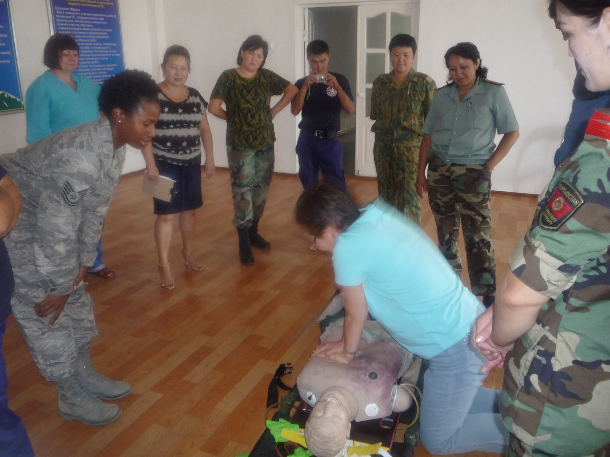 Tech. Sgt. Janice Trader (left) is deployed from the 633rd Medical Operations Squadron to Manas Air Base, Krgyzstan, where she serves as an EMT. Trader has served on active duty for 14 years. (Courtesy photo)