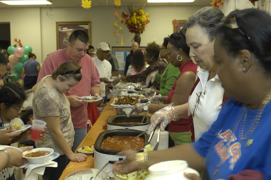 Participants of Hallelujah Night partake in dinner at Luke Air Force Base, Ariz., Oct 28, 2011. Games, food and live entertainment were provided during  this annual event held by the Luke Chapel. (U.S. Air Force photo by Staff Sgt. Jason Colbert/Released)