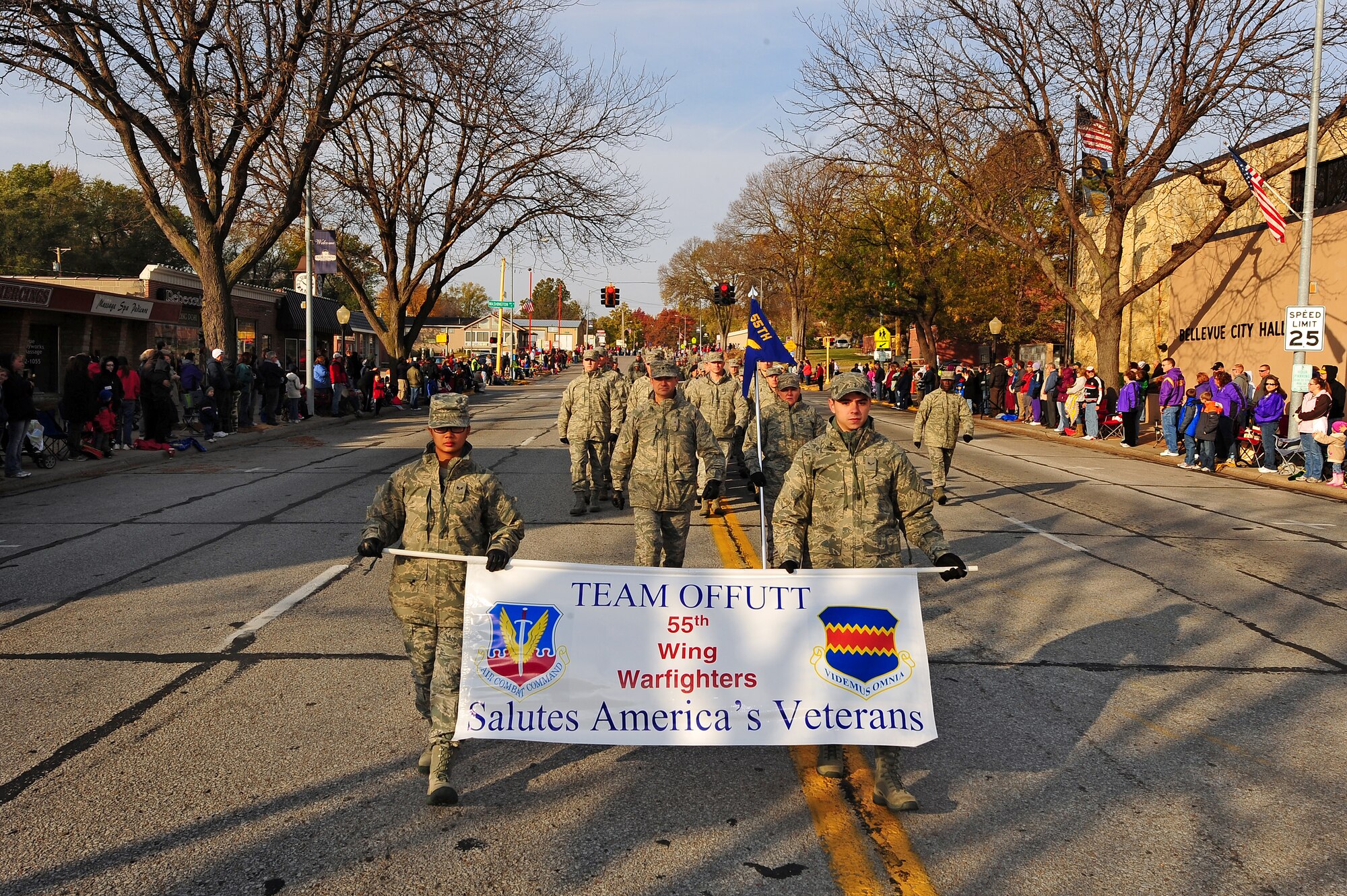U.S. Air Force Brig. Gen. Donald Bacon, 55th Wing commander, leads members of the 55th Wing down Mission Avenue, in Bellevue, Neb. as part of the 2011 Veterans Day Parade Nov. 5.  Offutt and the Bellevue community have a long history working together as a team. (U.S. Air Force photo by Josh Plueger/Released)