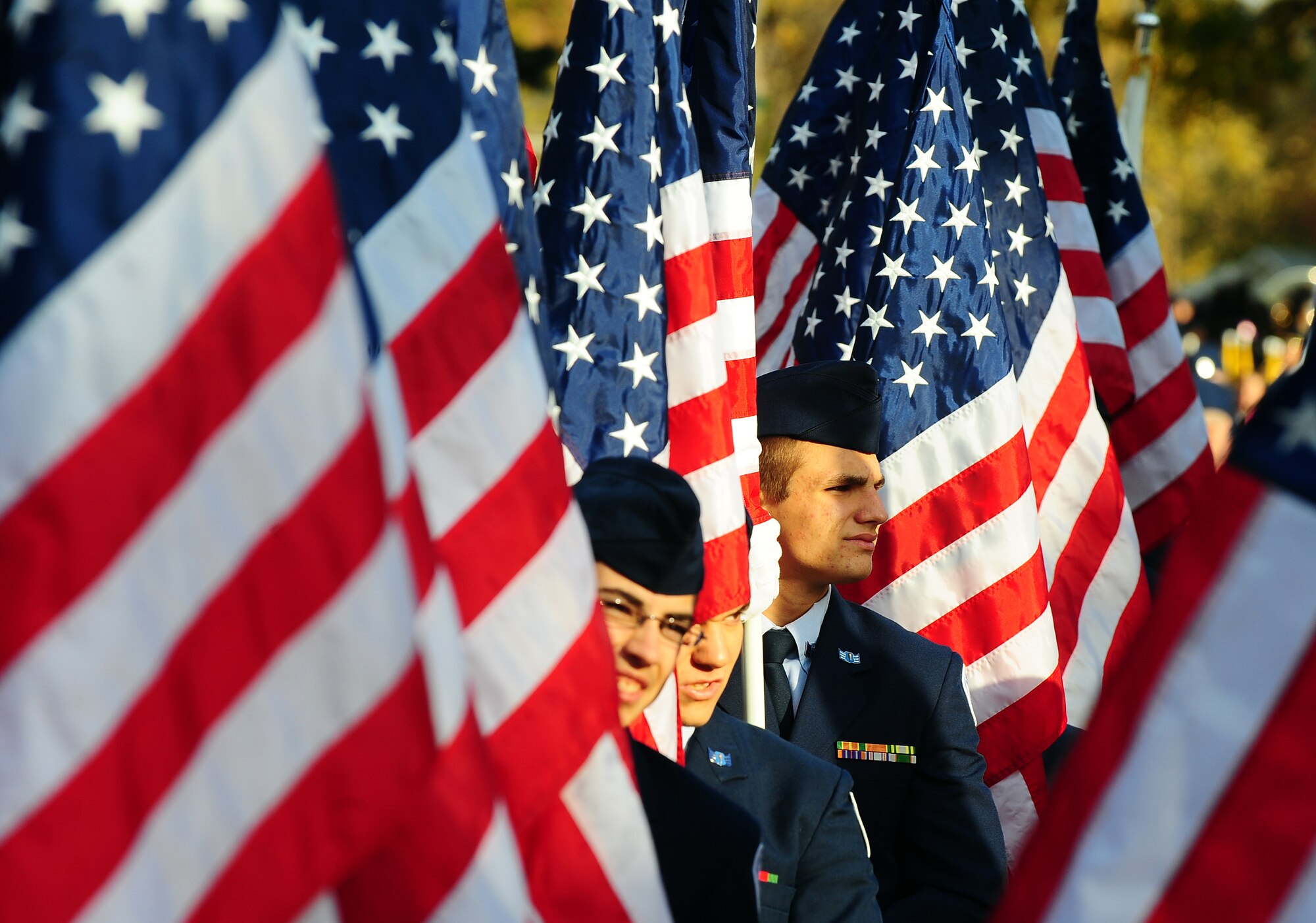 Bellevue West High School ROTC cadet Larry Holley stands in a joint formation of Bellevue East and Bellevue West ROTC members prior to marching in the 2011 Veterans Day parade on Mission Ave. in Bellevue, Neb., Nov. 5.  The Bellevue community boasts one of the nation's largest ROTC programs, and is a staple formation in the Veterans Day parade. (U.S. Air Force photo by Josh Plueger/Released)