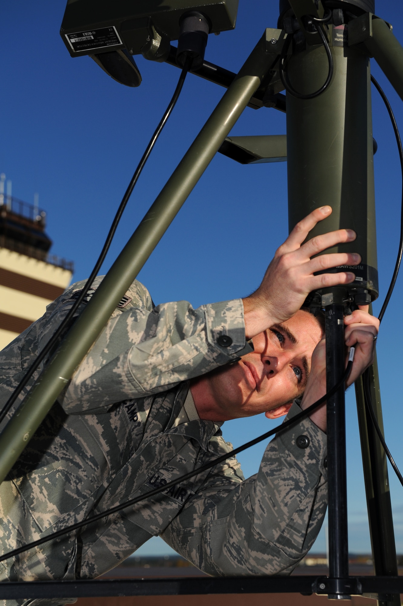SPANGDAHLEM AIR BASE, Germany – Staff Sgt. Andrew Camp, 52nd Operations Support Squadron weather technician, works to set up a TQM-53 tactical meteorological observing system here Nov. 4. The 52nd OSS Weather Flight received an “Excellent” rating on its Standardization and Evaluation Program for Weather Operations inspection after demonstrating their ability to provide safe and efficient air-traffic service to the 52nd Fighter Wing and 726th Air Mobility Squadron. (U.S. Air Force photo/Airman 1st Class Matthew B. Fredericks)