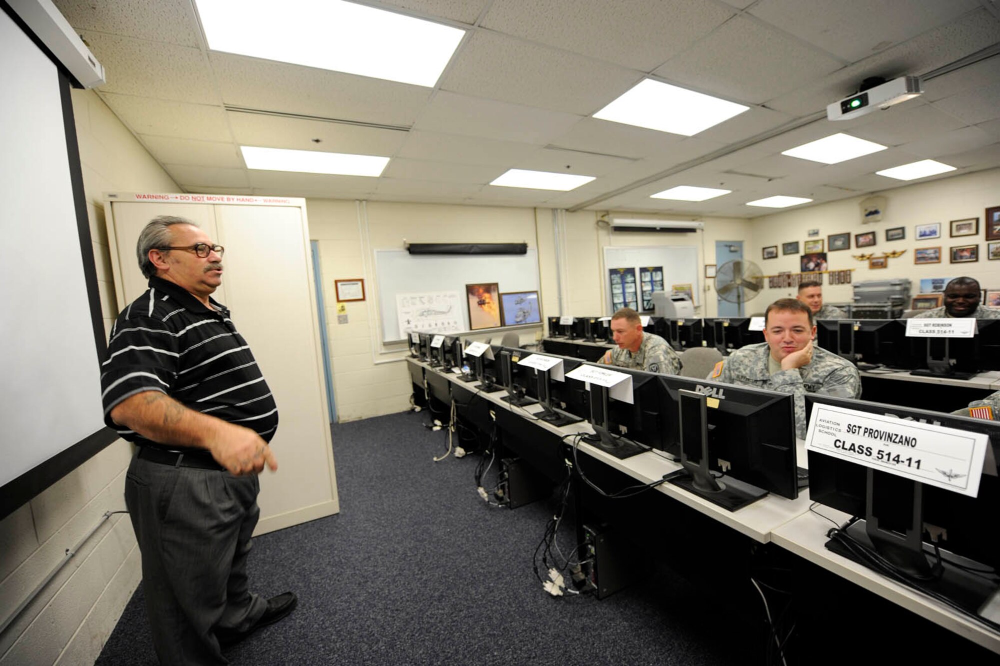 Nolan Billiot, U.S. Army Aviation Logistics School instructor, prepares his 15K-40 Senior Leadership Course students for an upcoming exam. Billiot said being named USAALS civilian Instructor of the Year was one of his many rewarding experiences. (U.S. Air Force photo by Tetaun Moffett/RELEASED)