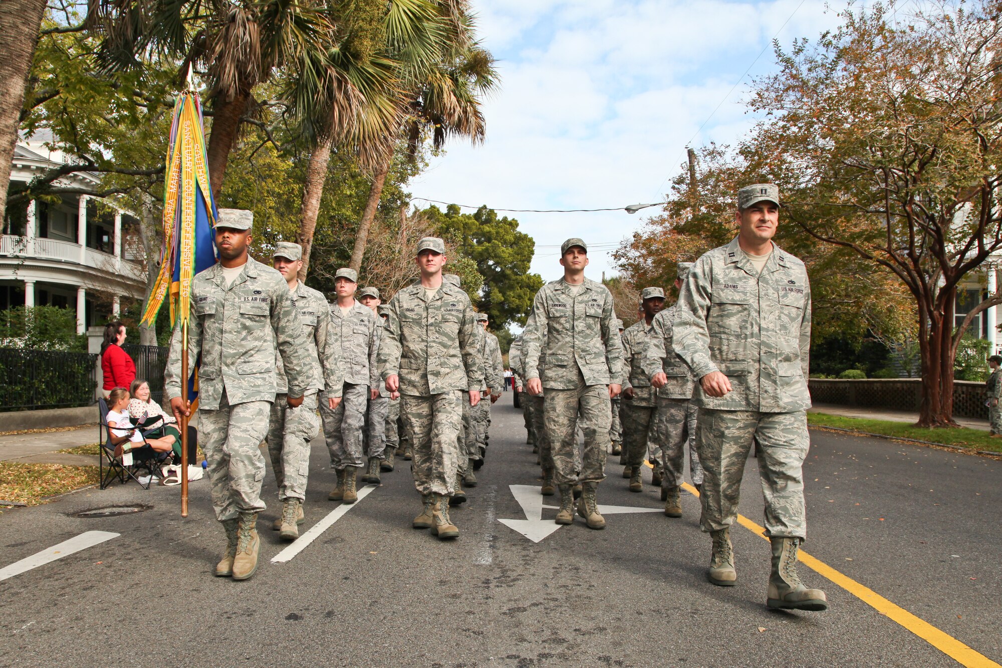 Captain Taylor Adams marches a flight of 315th Airlift Wing members during the annual Charleston Veteran's Day parade.  (U.S. Photo/Staff Sgt. Rashard Coaxum)