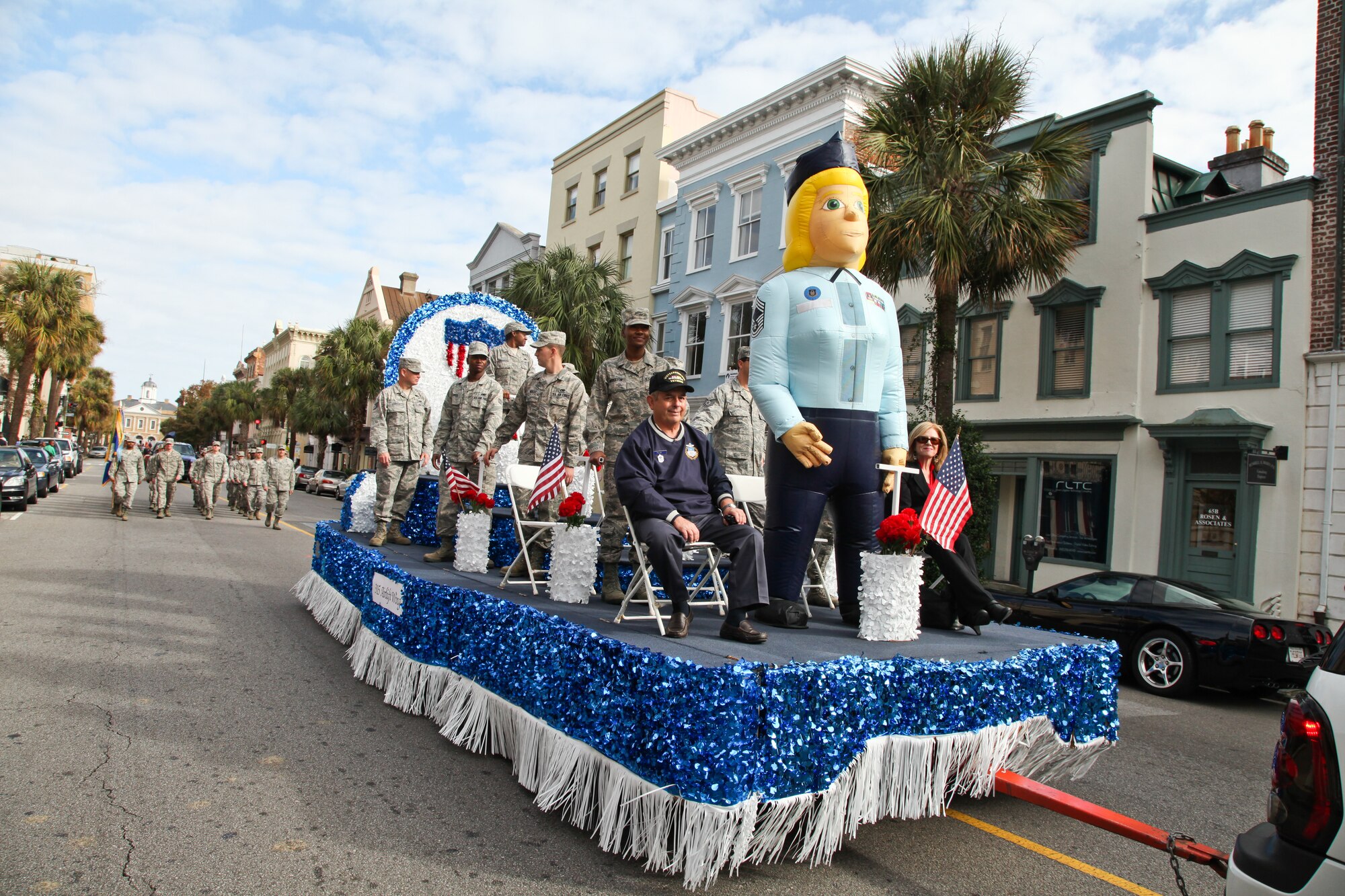Members of the 315th Airlift Wing ride a float and participate in the annual Charleston Veteran's Day parade.  (U.S. Photo/Staff Sgt. Rashard Coaxum)
