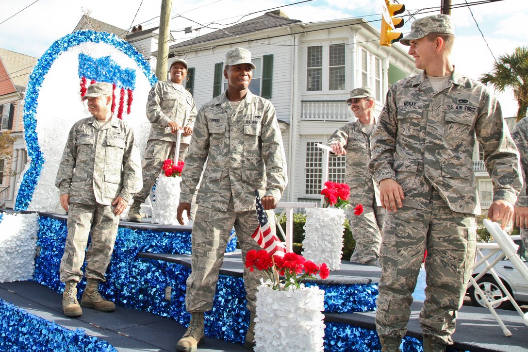 Members of the 315th Airlift Wing ride on a float during the annual Charleston Veteran's Day parade.  (U.S. Photo/Staff Sgt. Rashard Coaxum)
