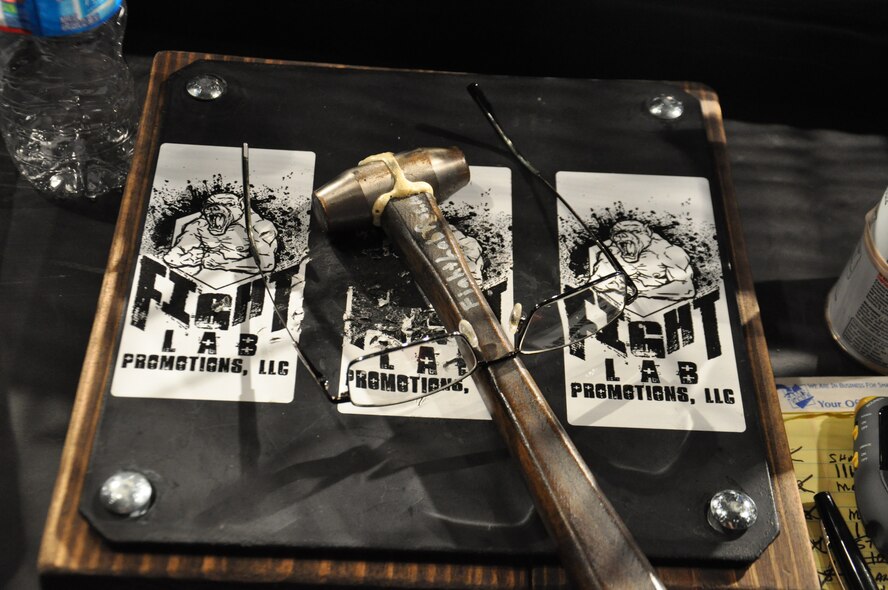 Fight Lab held a mixed martial arts (MMA) fight on Seymour Johnson Air Force Base, N.C., Nov. 4, 2011, at the 916th Air Refueling Wing corrosion control hangar.  Fight Lab is based out of Charlotte and  owned by Ken Letts, Jr. and is the company that puts on the show and contracts the fighters. The MMA fight consisted of seven competitions with three five minute rounds each. (U.S. Air Force photo by Airman 1st Class Mariah Tolbert)