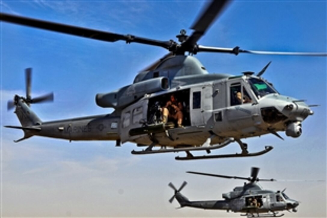 UH-1Y Huey Helicopters depart Camp Bastion Airfield with U.S. Marine Corps Gen. John R. Allen, commander of U.S. and international forces in Afghanistan, and Marine Corps Maj. Gen. John A. Toolan, commander of Regional Command-Southwest, in Helmand province, Afghanistan, Nov. 7, 2011. Allen and Toolan took part in a working lunch and operational update briefings with Marines from the 3rd Battalion, 7th Marine Corps Regiment deployed to Helmand province's Sangin district.