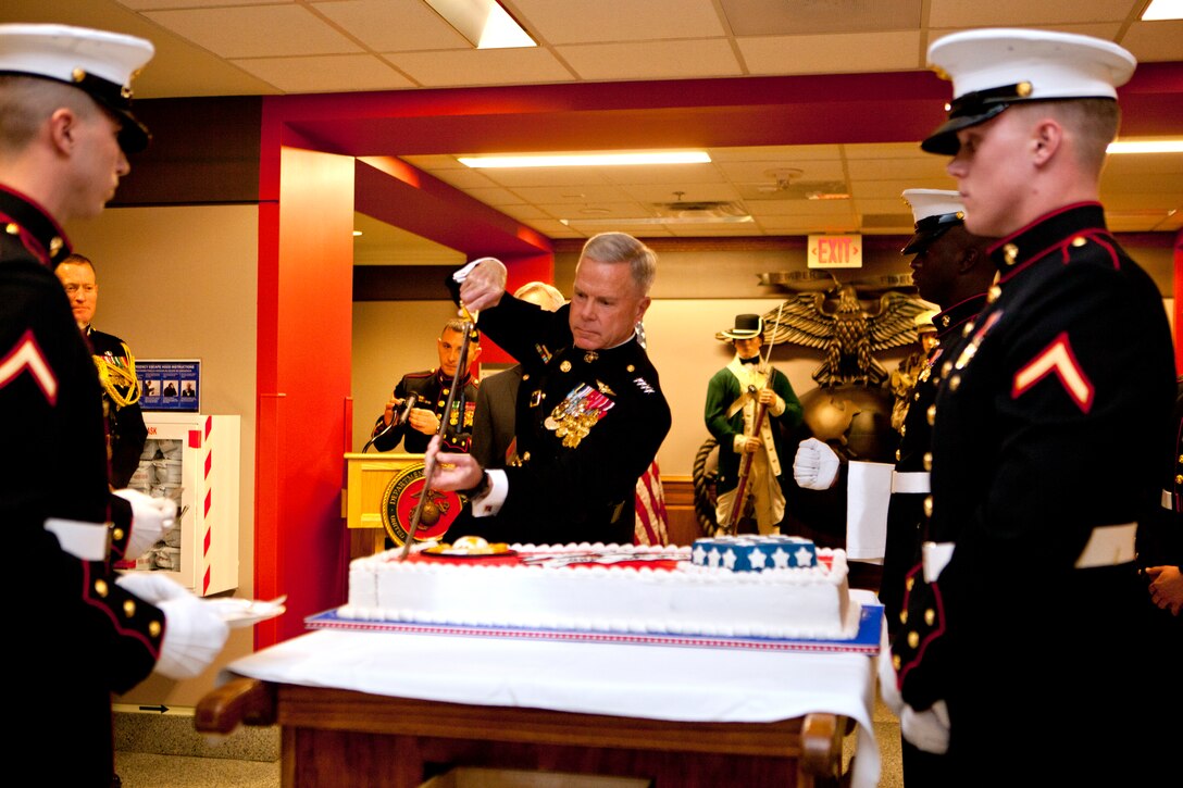 Commandant of the Marine Corps Gen. James F. Amos cuts the Marine Corps birthday cake during the cake cutting ceremony at the Pentagon in Washington Nov. 8. A sword is used to cut the cake to remind Marines that they are a band of warriors, committed to carrying the sword so that the nation may live in peace.  ::r::::n::