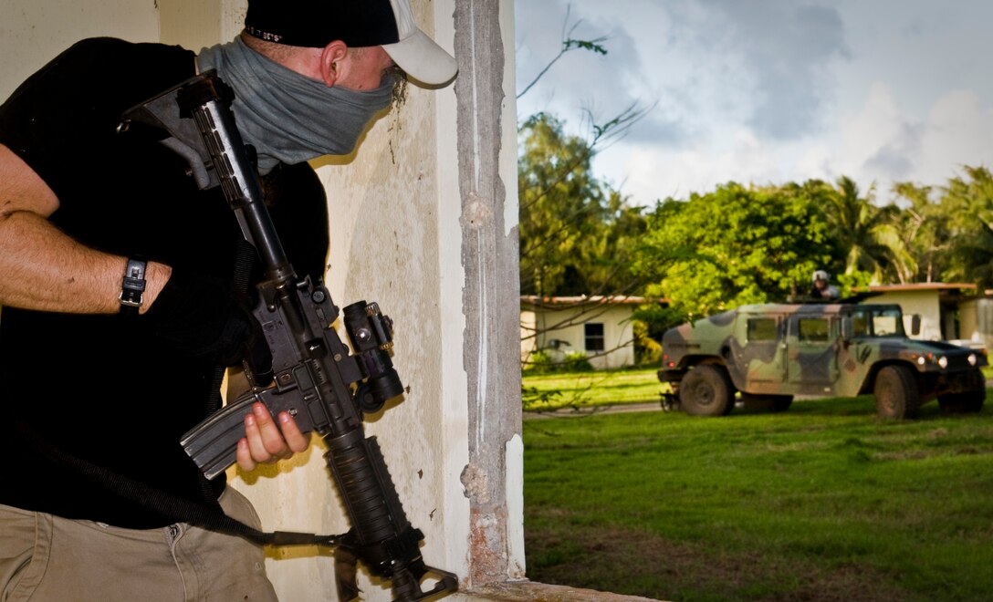 ANDERSEN AIR FORCE BASE, Guam— A member of the opposing force prepares to ambush defenders during training at the Pacific Air Force Regional Training Center here, Nov. 7. The 736th Security Forces Squadron Commando Warrior Flight is responsible for preparing frontline defenders from around the Pacific Air Forces for deployment.  (U.S. Air Force photo by Senior Airman Benjamin Wiseman/Released)
