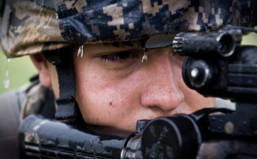 ANDERSEN AIR FORCE BASE, Guam—Airman 1st Class Israel Garcia, 36th Security Forces Squadron member, looks down the sights of an M4 assault rifle during training at the  Pacific Air Forces Regional Training Center here, Nov. 7. Each defender in training was taught war-fighting techniques by cadres assigned to the 736th Security Forces Squadron Commando Warrior Flight. (U.S. Air Force photo by Senior Airman Benjamin Wiseman/Released)