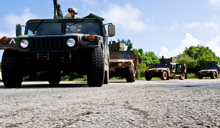 ANDERSEN AIR FORCE BASE, Guam—Humvees await departure during Pacific Air Forces Regional Training Center training here, Nov. 5. The mission of the PRTC Commando Warrior course is to enhance the combat readiness of PACAF forces through training and evaluation of force protection and ground combat skills. (U.S.  Air Force photo by Senior Airman Benjamin Wiseman/Released)