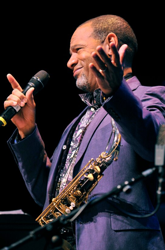 Saxophonist Kirk Whalum shares a special moment with the audience during a Jazz Heritage Series performance featuring the USAF Airmen of Note on November 4, 2011 at The George Washington University in Washington, D.C.