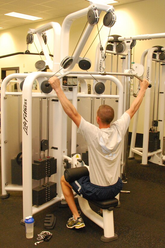 A Sheppard Airman works out on new gym equipment at Pitsenbarger Fitness Center, Sheppard Air Force Base, Texas, Nov. 8, 2011. Gym equipment at Pitsenbarger and Levitow fitness centers is being replaced in a five-phase process that began in September and will conclude in December. (U.S. Air Force photo/Capt. Brittany Martin)