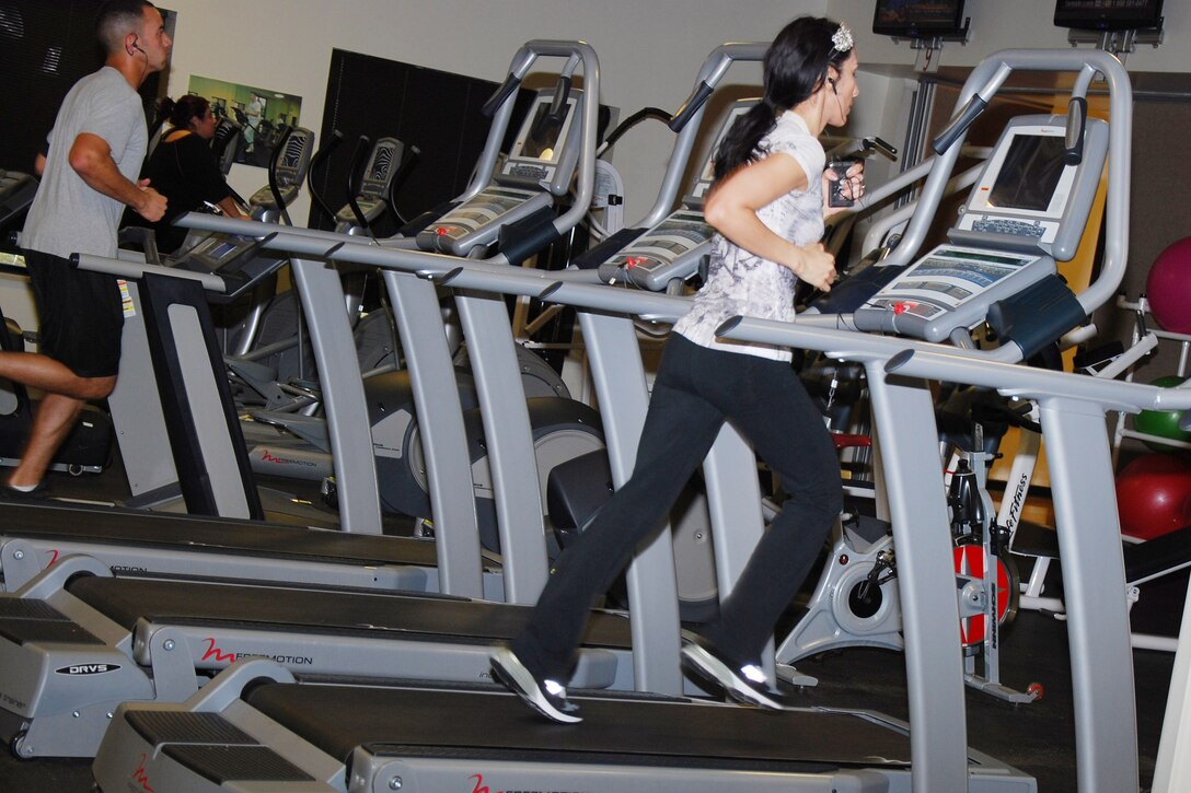 A Sheppard member runs on one of the gym’s new treadmills at Pitsenbarger Fitness Center, Sheppard Air Force Base, Texas, Nov. 8, 2011; an old treadmill can be seen in the background. Gym equipment at Pitsenbarger and Levitow fitness centers is being replaced in a five-phase process that began in September and will conclude in December. (U.S. Air Force photo/Capt. Brittany Martin)