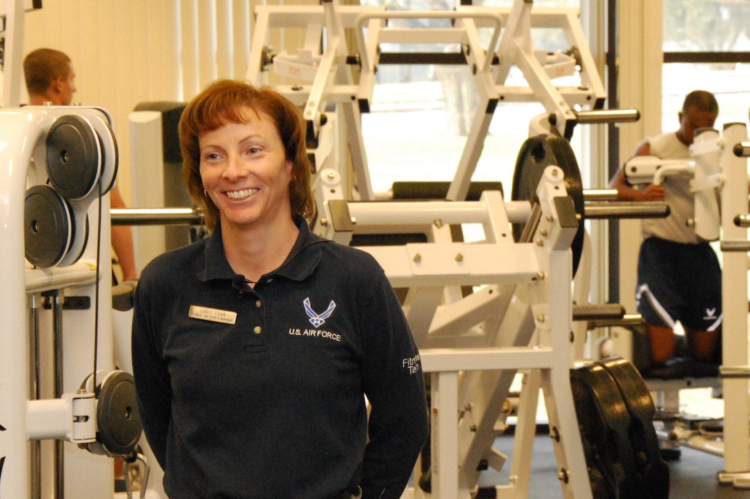 Sheppard Fitness and Sports Manager Cindy Conn explains the gym equipment upgrade project at Pitsenbarger Fitness Center, Sheppard Air Force Base, Texas, Nov. 8, 2011. Gym equipment at Pitsenbarger and Levitow fitness centers is being replaced in a five-phase process that began in September and will conclude in December. (U.S. Air Force photo/Capt. Brittany Martin)