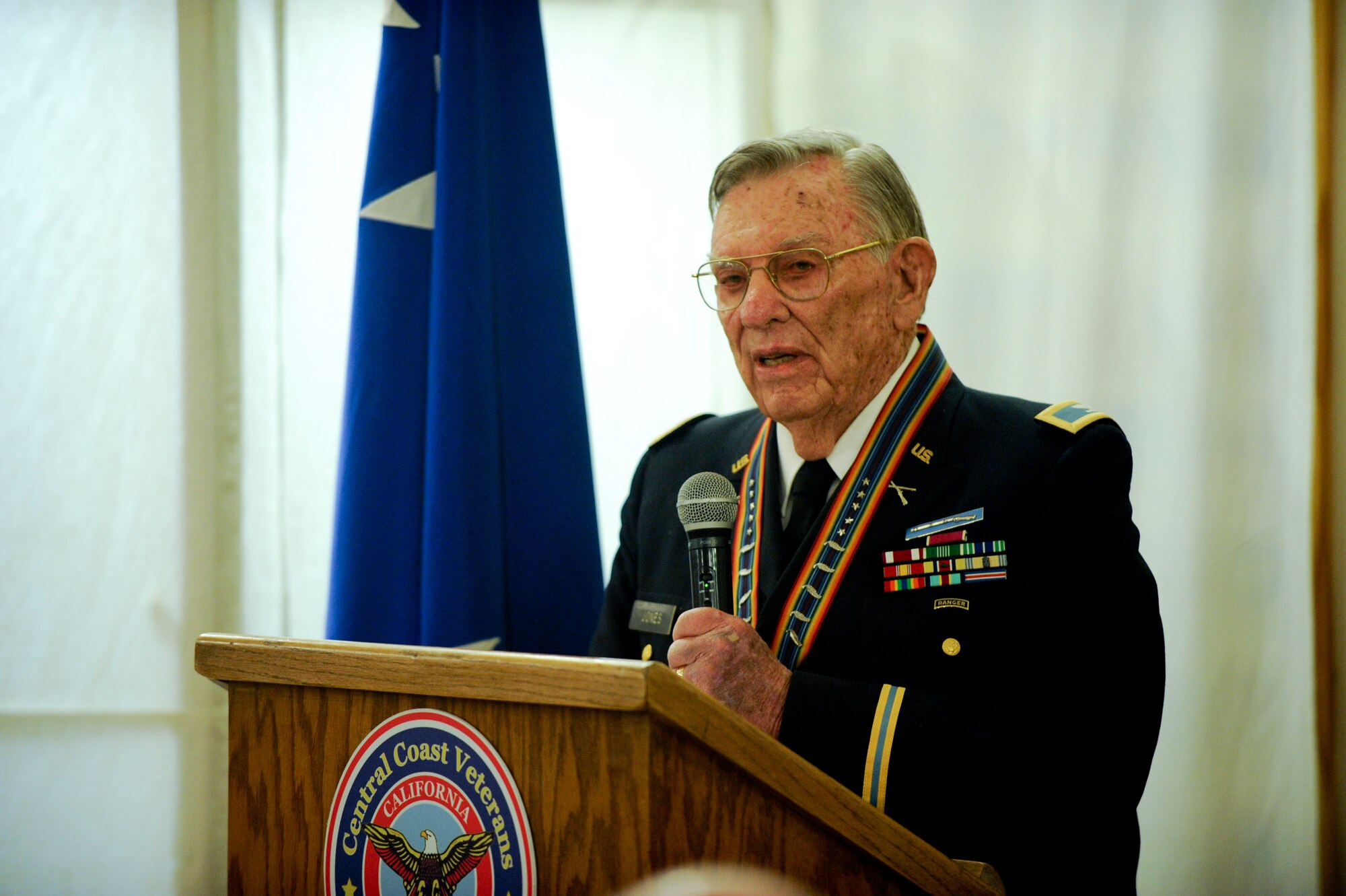 VANDENBERG AIR FORCE BASE, Calif. -- Retired Army Col. Jack Jones, Central Coast Veterans Memorial Museum president, introduces the museum's newest display which includes Gen. Hoyt S. Vandenberg's uniform, his medals and other memorabilia at the museum in San Luis Obispo, Calif., Tuesday, Nov. 8, 2011. Maj. Gen. Hoyt S. Vandenberg Jr. donated his father's uniform items to the Vandenberg chapter of the Military Order of World War who then loaned the items to the museum for permanent display. Gen. Vandenberg was the Air Force's second Chief of Staff, is known for officially authorizing the Air Force's blue service dress and has Vandenberg Air Force Base named after him. (U.S. Air Force photo/Staff Sgt. Levi Riendeau)
