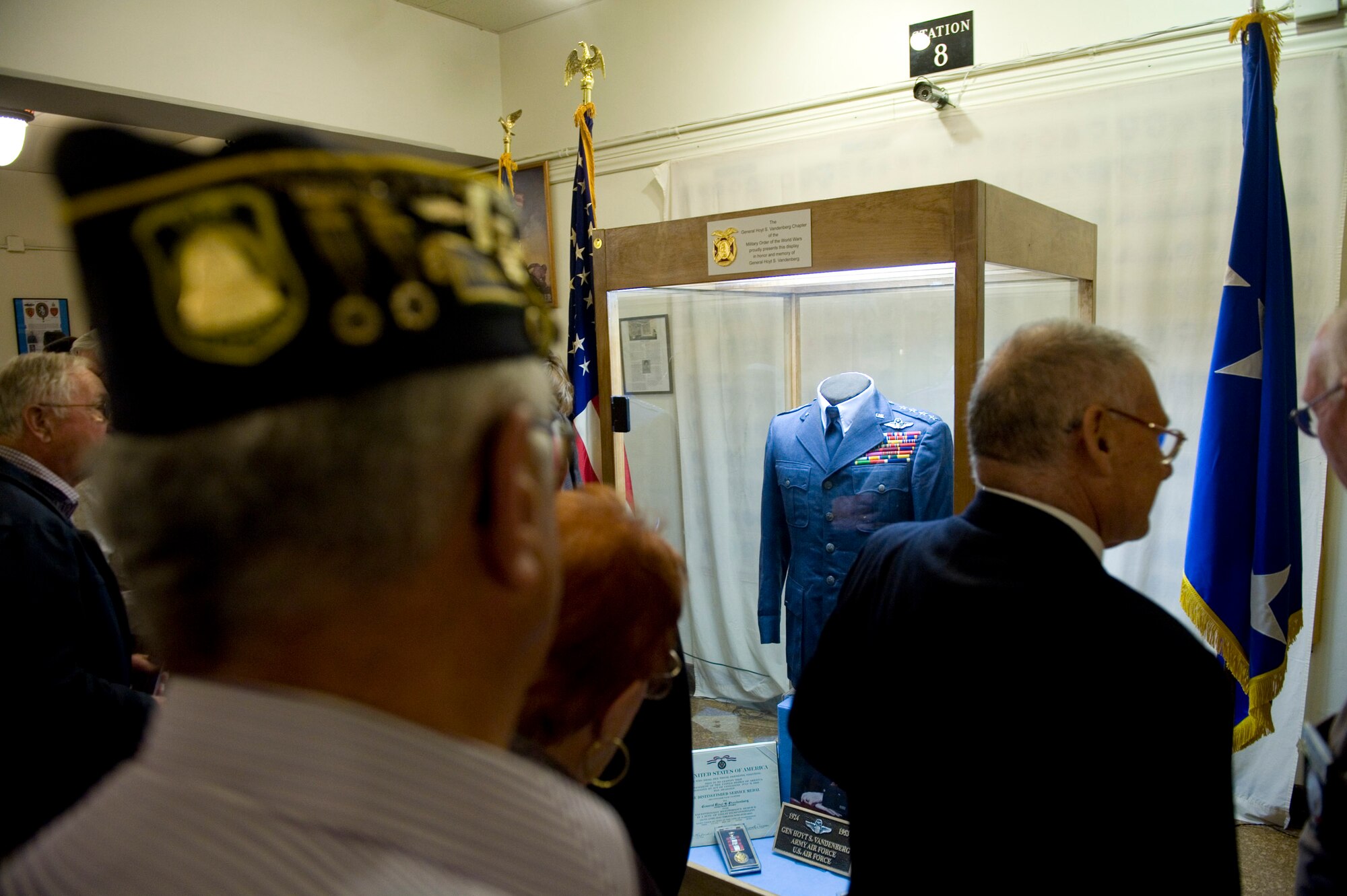 VANDENBERG AIR FORCE BASE, Calif. -- Museum patrons view the Gen. Hoyt S. Vandenberg display at the Central Coast Veterans Memorial Museum in San Luis Obispo, Calif., Tuesday, Nov. 8, 2011. Maj. Gen. Hoyt S. Vandenberg Jr. donated his father' uniform items to the Vandenberg chapter of the Military Order of World War who then loaned the items to the museum for permanent display. Gen. Vandenberg was the Air Force's second Chief of Staff, is known for officially authorizing the Air Force's blue service dress and has Vandenberg Air Force Base named after him. (U.S. Air Force photo/Staff Sgt. Levi Riendeau)
