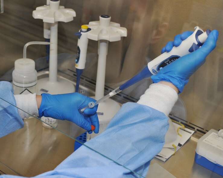 U.S. Air Force Staff Sgt. Jennifer Johnson, 9th Medical Support Squadron laboratory technician, tests a biological sample at the medical laboratory on Beale Air Force Base, Calif., Nov. 9, 2011.  The laboratory has the ability to tests biological samples such as anthrax.  (U.S. Air Force photo by Staff Sgt. Jonathan Fowler)