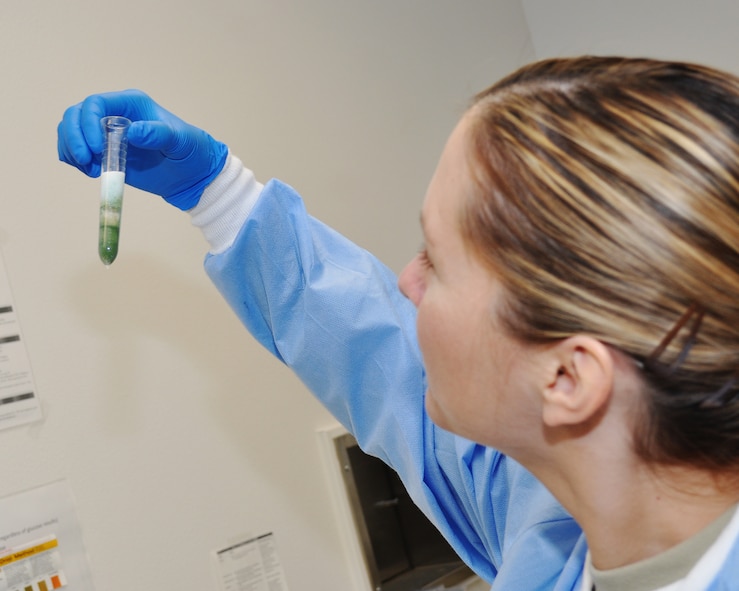 U.S. Air Force Staff Sgt. Jennifer Johnson, 9th Medical Support Squadron laboratory technician, tests a urine sample at the medical laboratory on Beale Air Force Base, Calif., Nov. 9, 2011.  The laboratory takes blood and urine samples for testing to ensure military members are healthy.  (U.S. Air Force photo by Staff Sgt. Jonathan Fowler)