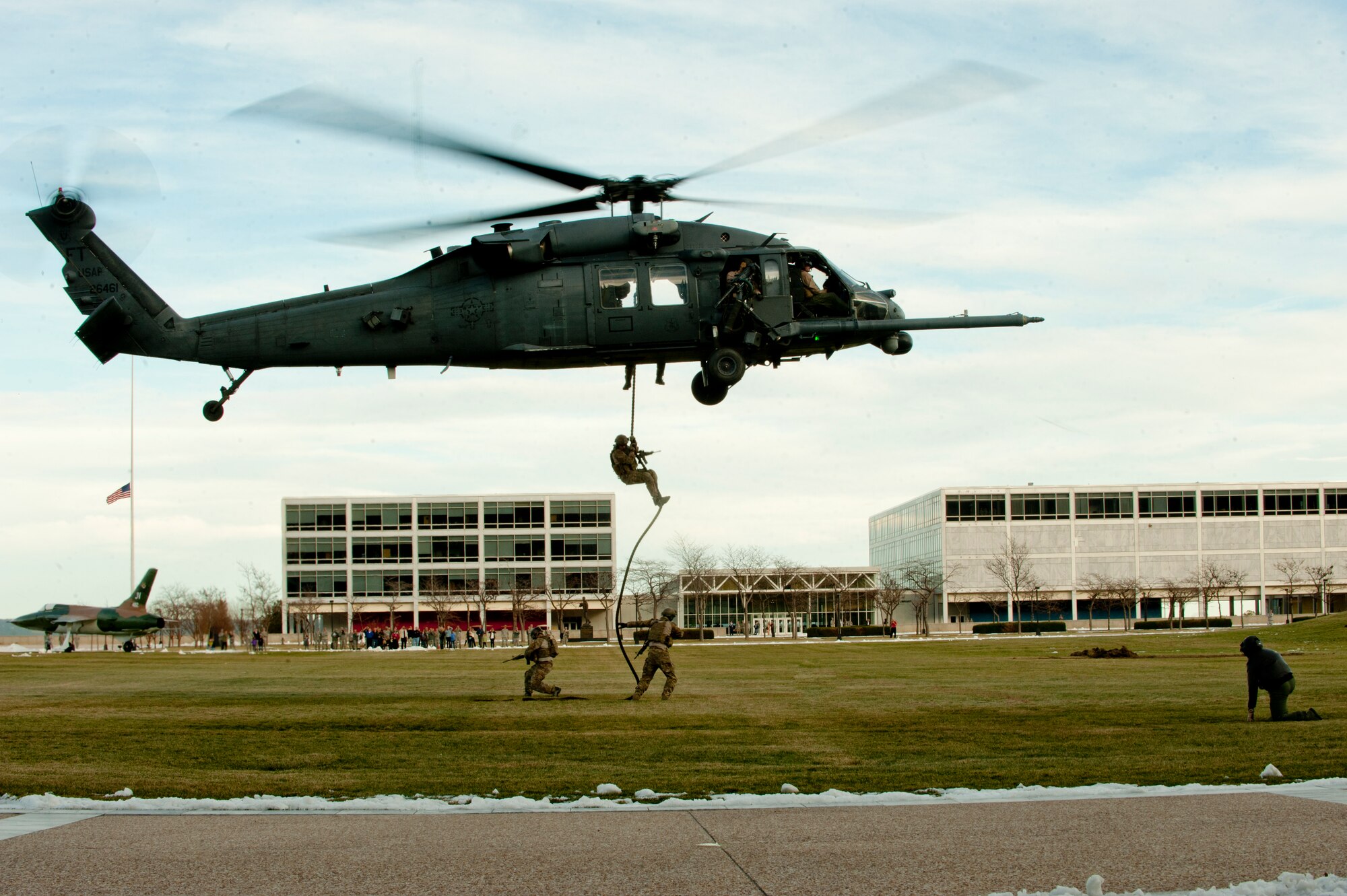 Pararescuemen from the 58th Rescue Squadron out of Nellis Air Force Base, Nev. a geographically separated unit (GSU) of the 23d Wing at Moody Air Force Base, Ga., fast rope to the ground during a personnel recovery demonstration for the U.S. Air Force Academy in Colorado Springs, Colo., Nov. 4, 2011. During the demonstration, pararescuemen secured the area and recovered downed personnel prior to evacuating the site. (U.S. Air Force photo by Staff Sgt. Joshua J. Garcia/Released)