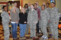 LAUGHLIN AIR FORCE BASE, Texas—Personnel from the 47th Medical Group pose for the camera after games of team-building bowling at Cactus Lanes here Nov. 4. The 47th MDG was bowling for Medical Service Corps and Health Services Management Appreciation Week, which is a service-wide event building camaraderie and partnership for Air Force medical personnel across the globe. (U.S. Air Force photo/2nd Lt. James Ramirez)