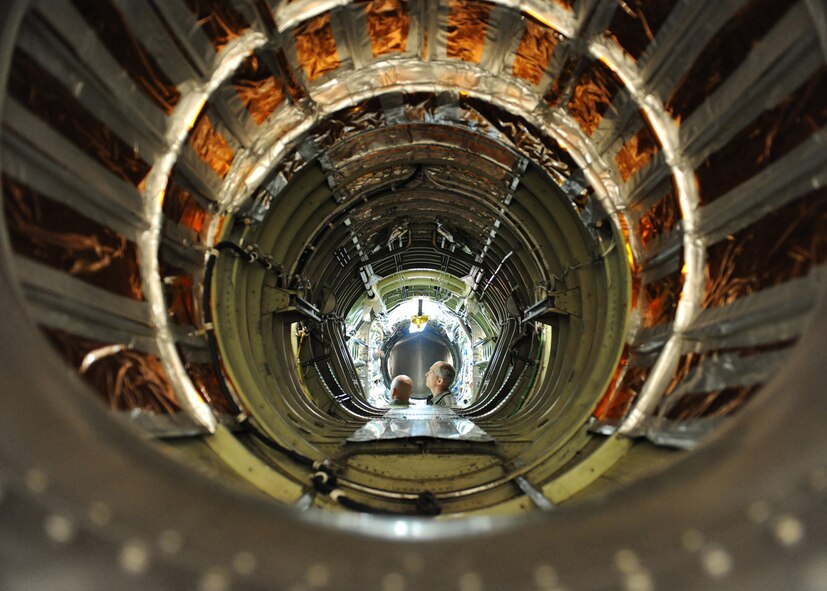 Commander of Air Combat Command, Gen. Mike Hostage, looks at flight control cables and fuel system manifolds in the engine bay of a U.S. Air Force U-2 Dragon Lady intelligence, surveillance and reconnaissance aircraft at Beale Air Force Base, Calif., Nov. 7, 2011, during routine phased maintenance. Hostage visited Beale to meet with wing members and gain a better understanding of the mission. (U.S. Air Force photo by Mr. John Schwab/Released)