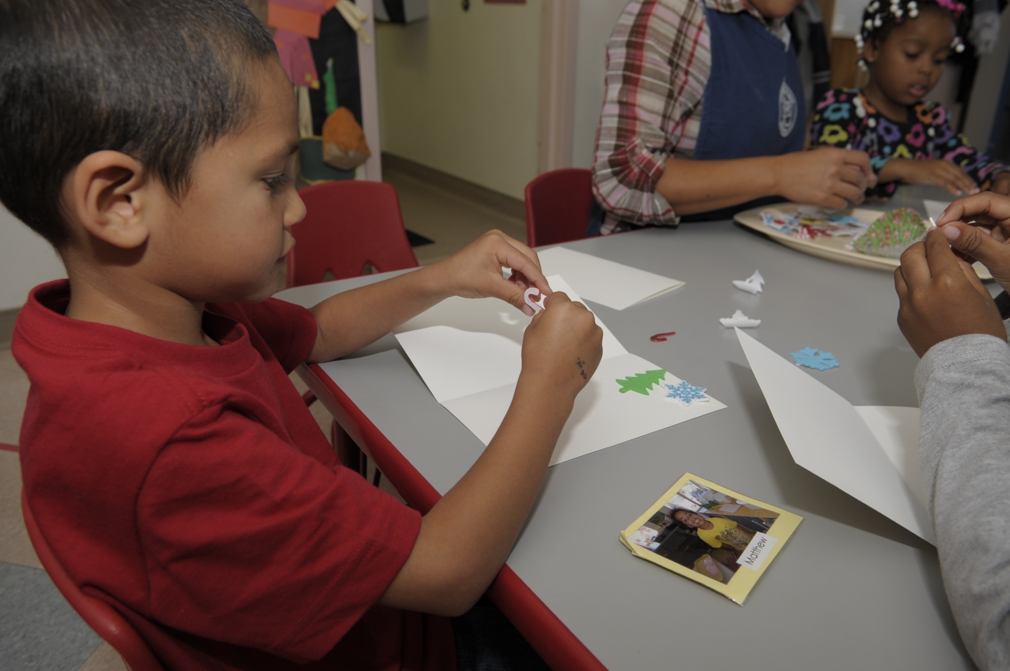 VANDENBERG AIR FORCE BASE, Calif. -- Children create holiday cards for their deployed parents at the Child Development Center here Tuesday, Nov. 8, 2011. The cards, pictures and drawings will be displayed at the White House, Washington D.C.
(U.S. Air Force photo/Jerry E. Clemens, Jr.)