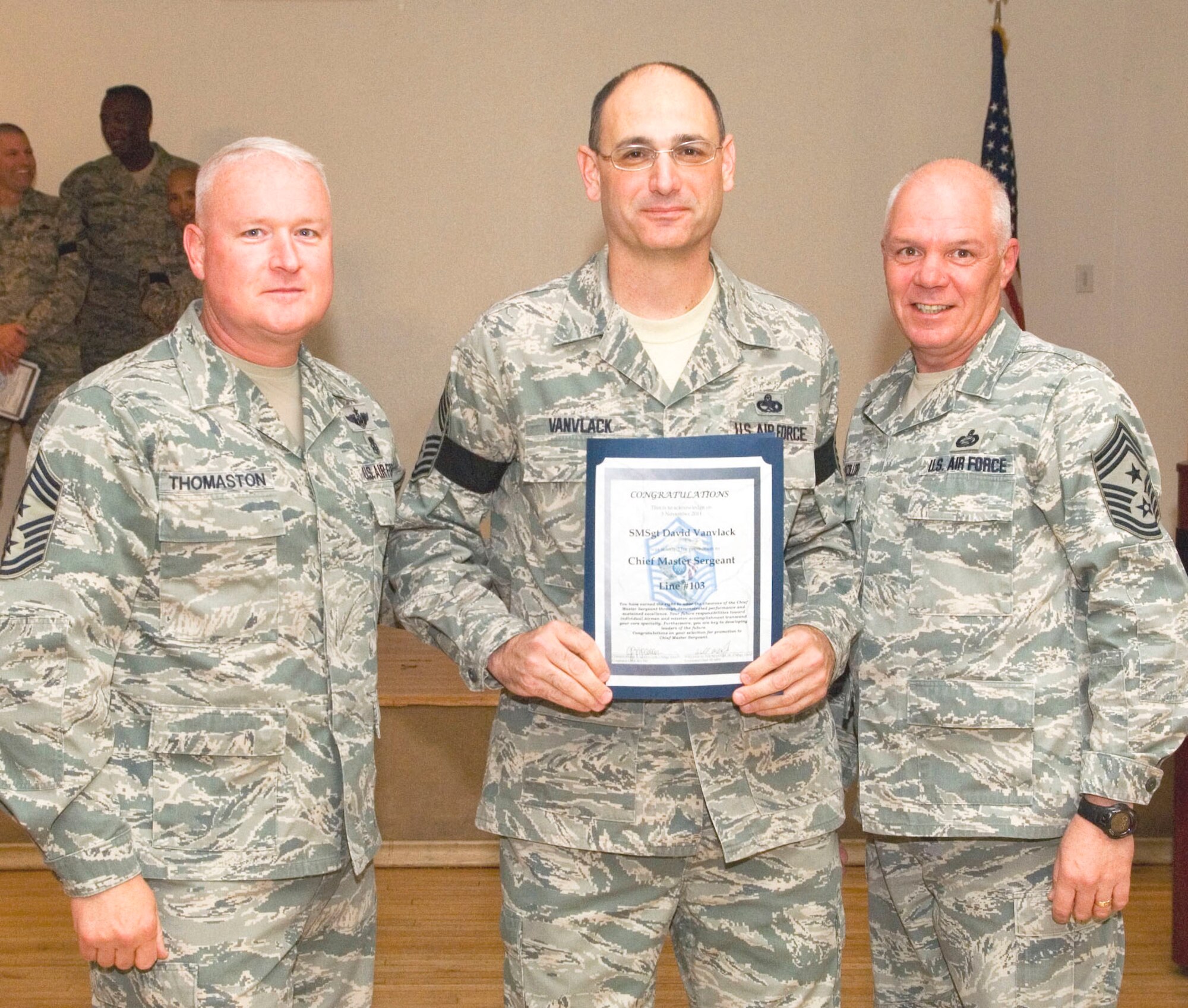 Senior Master Sgt.  David Vanvlack, superintendent, Air Force Operational
Test and Evaluation Center, Det. 1, has been selected for promotion to Chief
Master Sgt., is notified by Chief Master Sgt. Bill Thomaston, command chief,
95th Air Base Wing, and Chief Master Sgt. Chris McCollor, command chief,
412th Test Wing, during a celebration here Nov. 3. (U.S. Air Force Photo by
Civ/Edward Cannon)
