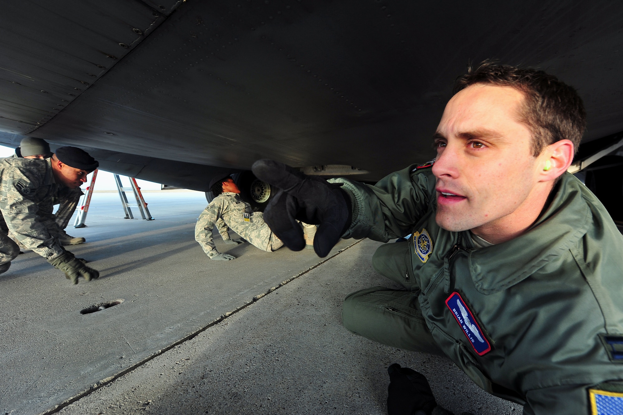 MINOT AIR FORCE BASE, N.D. -- Capt. Brian Willis, navigator for McChord AFB’s 4th Airlift Squadron, conducts a tour of a C-17 Globemaster III here Nov. 4. The purpose of the tour was to provide 5th Security Forces Squadron team members with information in preparation for an upcoming inspection. The additional training provides forces with further knowledge of the C-17 Globemaster. (U.S. Air Force Photo/Senior Airman Jesse Lopez)

