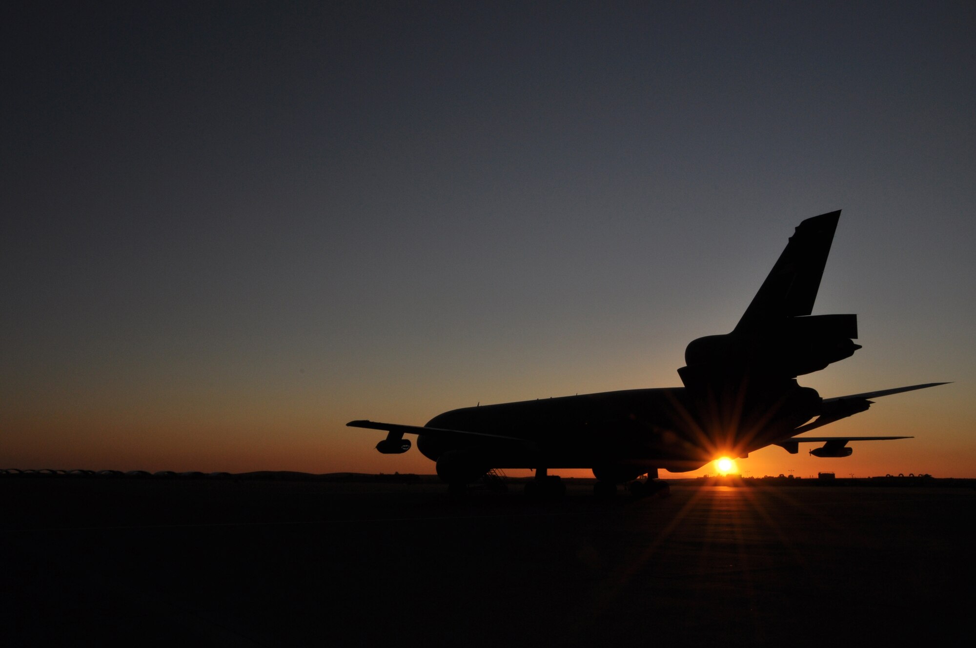 The last aircraft, a KC-10 Extender, deployed to the 313th Air Expeditionary Wing  in the European theater of operations, sits on the ramp at a non-disclosed base in Western Europe on Nov. 7, 2011. The KC-10, assigned to Joint Base McGuire-Dix-Lakehurst, N.J., departed the European theater on Nov. 8, 2011. The 313th AEW provided air refueling assets to NATO during Operation Unified Protector, the United Nations' mandated mission to protect citizens of Libya. The operation concluded Oct. 31, 2011. (U.S. Air Force Photo/Maj. Andra Higgs) 