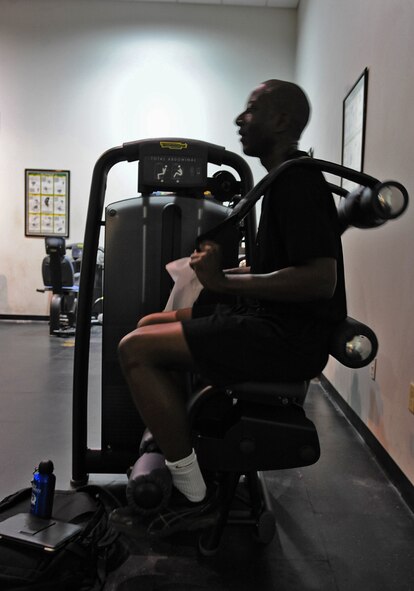 Airman 1st Class William Waitman, 7th Force Support Squadron, exercises on new equipment in the fitness center Nov. 3, 2011, at Dyess Air Force Base, Texas. The fitness center underwent renovation which includes new weights and 34 exercise machines, estimated at over $184,000. (U.S. Air Force photo by Airman 1st Class Peter Thompson/Released) 