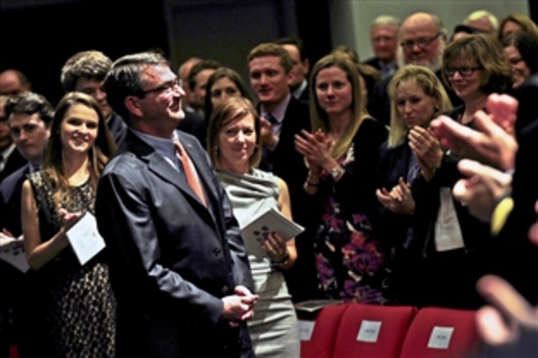Deputy Defense Secretary Ashton B. Carter receives a standing ovation during a welcoming ceremony held in his honor at the Pentagon, Nov. 9, 2011.  Carter was sworn in as the 31st Deputy Defense Secretary on Oct. 6, 2011. 