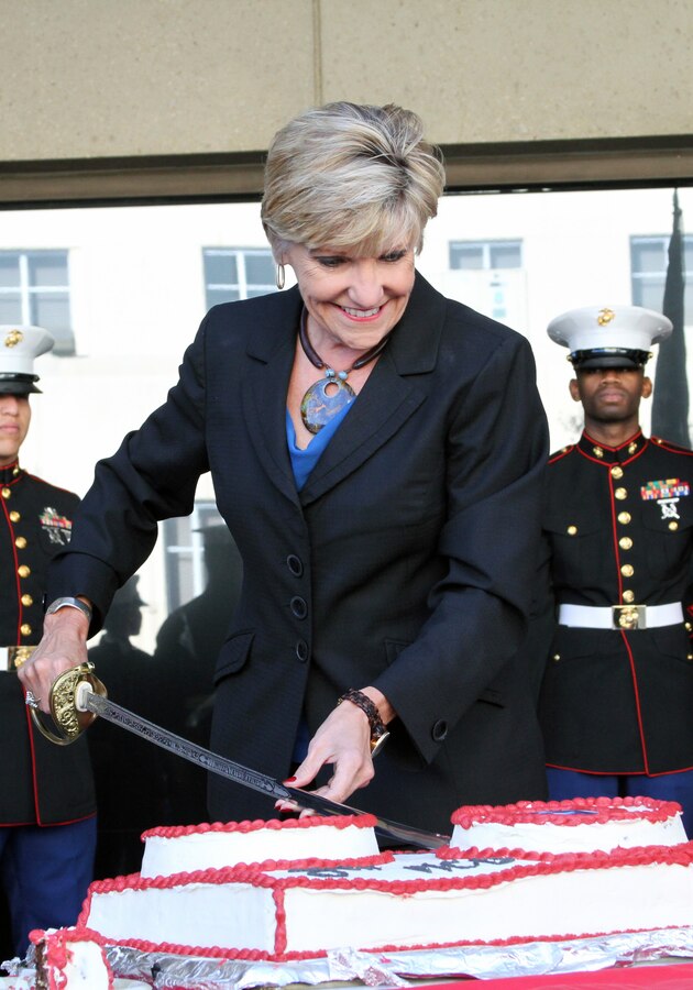City of Fort Worth Mayor Betsy Price cuts a piece of cake during the 8th Marine Corps District's Marine Corps birthday celebration outside of Fort Worth City Hall, Nov. 10. The celebration was held in honor of the Marine Corps' 236th birthday wherein the Mayor read a proclamation for the occasion.