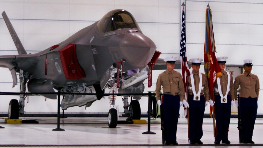 A Marine Corp color guard brings in the colors during the Marine Corp birthday cake cutting ceremony Nov. 10 at Eglin Air Force Base, Fla.  The ceremony was held by the men and women of the Marine Fighter Attack Training Squadron 501 (Photo by Marine Staff Sgt. Stacey Ann Viner)