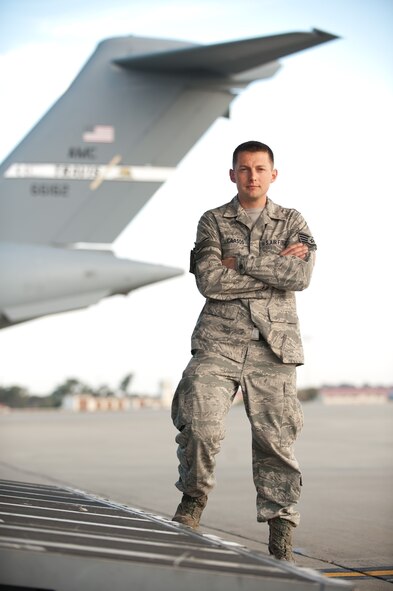 Staff Sgt. Bill Cavasos is an aircraft hydraulics specialist who works as a flying crew chief with the 860th Aircraft Maintenance Squadron at Travis Air Force Base, Calif. More than anything else, Cavasos enjoys flying with C-17 aircrews supporting worldwide missions. (U.S. Air Force photo/Ken Wright)