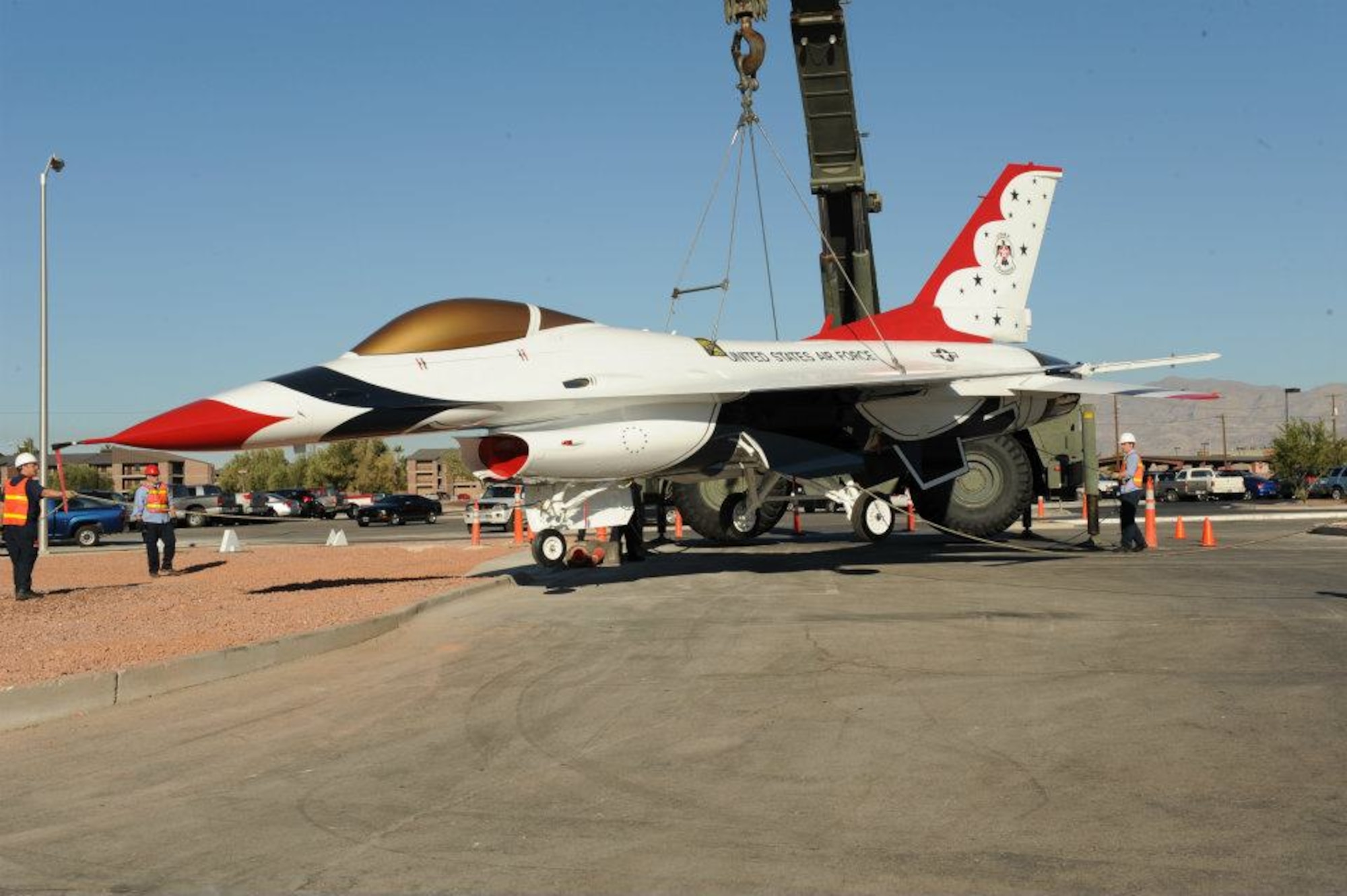 The Thunderbirds F-16C static display, tail number 87-0323, is placed on display outside the Thunderbird hangar on Oct. 31, 2011 at Nellis Air Force Base, Nev. The Thunderbirds transitioned from the F-16A/B in 1991 to the F-16C/D for the 1992 show season. (U.S. Air Force photo/Staff Sgt Richard W. Rose Jr.)