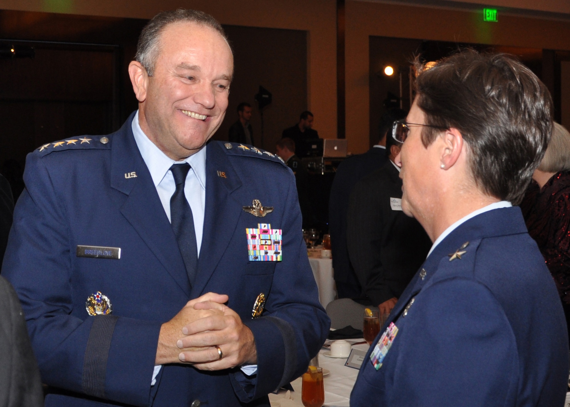 Air Force Vice Chief of Staff Gen. Phil Breedlove talks with Brig. Gen. Theresa Carter, 502nd Air Base Wing commander, before the Spirit of America dinner in San Antonio, Texas, Nov. 9, 2011.  Breedlove was the keynote speaker at the dinner, which was part of San Antonio's annual Celebrate America's Military tribute. (U.S. Air Force photo/Dianne Moffett)