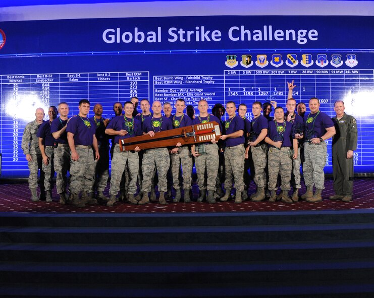 The 2nd Bomb Wing from Barksdale AFB, La., was awarded the Ellis Giant Sword for Best Bomber Maintenance Group during the second night of the Global Strike Challenge score posting at Barksdale Air Force Base, La., Nov. 9. Global Strike Challenge is an amalgam of the best of the historic bomb competition and the former missile competition held under previous major commands that owned the missile and bomber missions at the time. Global Strike Challenge is unique when compared to those competitions because it includes operations, maintenance and security force participants from both the missile and bomber communities under the 2-year-old Air Force Global Strike Command. It also welcomes teams and weapon systems from other major commands. (U.S. Air Force photo by Airman 1st Class Micaiah Anthony) 
