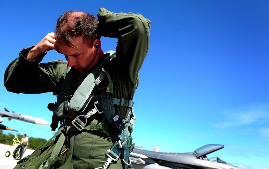 U.S. Air Force Lt. Col. Tom Seymour, an F-16 Fighting Falcon pilot, assigned to the 46th Test Wing prepares for a training flight in support of Exercise Vigilant Shield 12 at Naval Air Station Key West, Fla., Nov. 6, 2011. The exercise in Key West is the "first-ever proof of concept" for the military's Joint Deployable Integrated Air and Missile Defense System, a collection of high-end radars and missile systems as well as aircraft that work in tandem in the event of a threat to the continental United States.  (U.S. Air Force photo by Staff Sgt. Kamaile O. Long/Released)