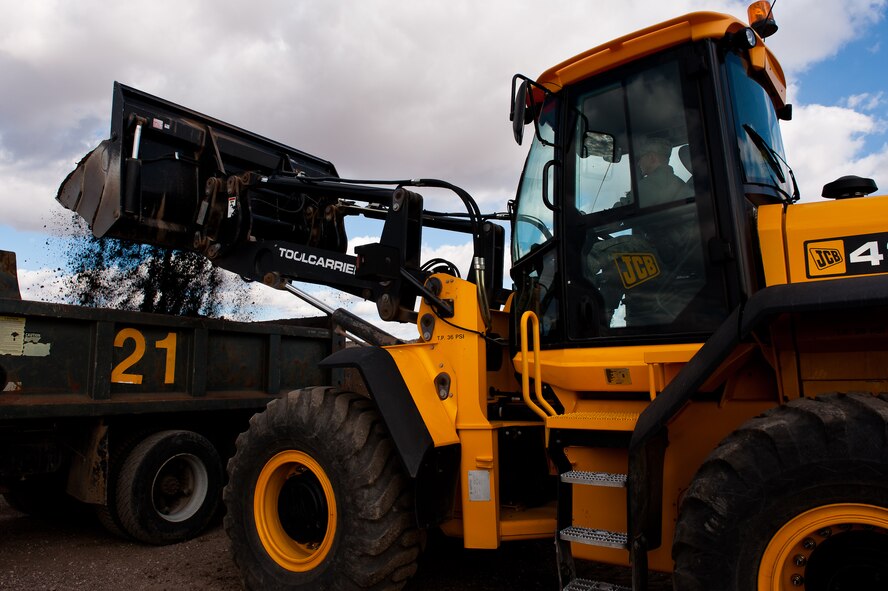 Airman 1st Class Jason Smith, 28th Civil Engineer Squadron power production technician, trains to be a snow removal augmentee at the Heavy Equipment Training Yard on Ellsworth Air Force Base, S.D., Nov. 9, 2011. Airmen from the 28th CES can volunteer to be part of the snow removal team whose mission is to clear roadways and parking lots during inclement weather. (U.S. Air Force photo by Airman 1st Class Kate Thornton/Released)  