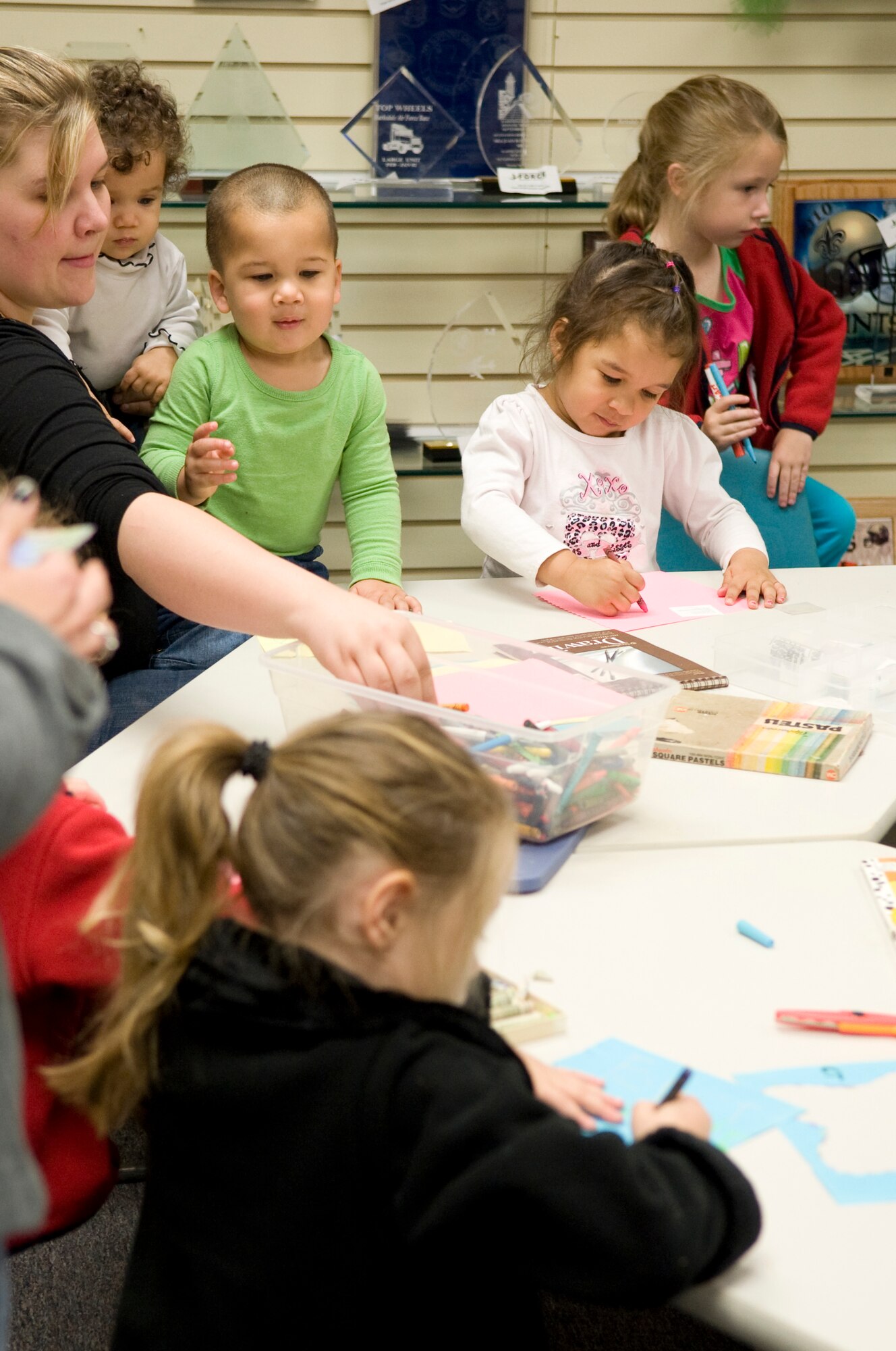 Children draw and paint in the Arts and Crafts Center during the Fall Festival on Barksdale Air Force Base, La., Nov. 5. The festival, hosted by the 2nd Force Support Squadron, helps raise morale for Airmen and their families. (U.S. Air Force photo/Airman 1st Class Benjamin Gonsier)(RELEASED)
