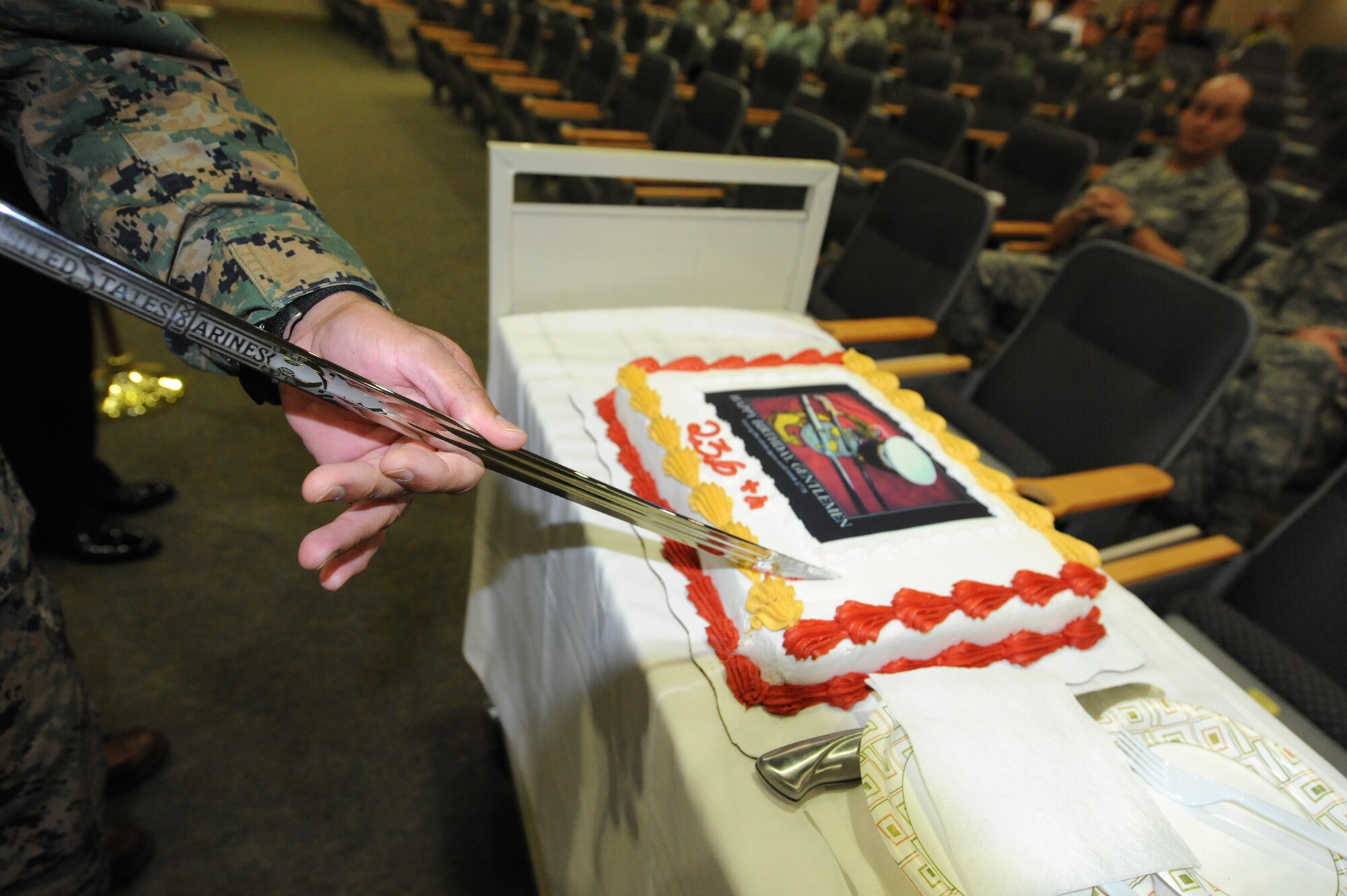 U.S. Marine Corps Lt. Col. Gilberto Gonzalez, Marine liaison for the 505th Training Squadron, uses a Mameluke sword to cut the cake commemorating the 236th birthday of the Marine Corps, Hurlburt Field, Fla., Nov. 10, 2011. The cutting of the Marine Corps birthday cake is an annual tradition that not only celebrates the history of the Marine Corps, but highlights each Marine’s commitment to the corps. (U.S. Air Force photo/Tech Sgt. Stacia Zachary)(Released)