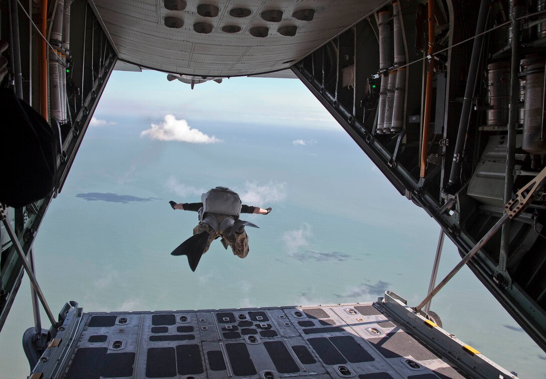A pararescueman from the 920th Rescue Wing at Patrick Air Force Base, Fla., free falls from a HC-130P/N King refueling aircraft at 3,500 feet during a Cocoa Beach Air Show demonstration Nov. 4, 2011. The Cocoa Beach Air Show will feature 920th RQW Rescue Reservists, HC-130P/N King aircraft and HH-60G Pave Hawk helicopters Nov. 5-6. Pararescuemen are able to perform life-saving missions in the world's most remote areas, by air, land or water. (Courtesy photo/Mike Brown)


